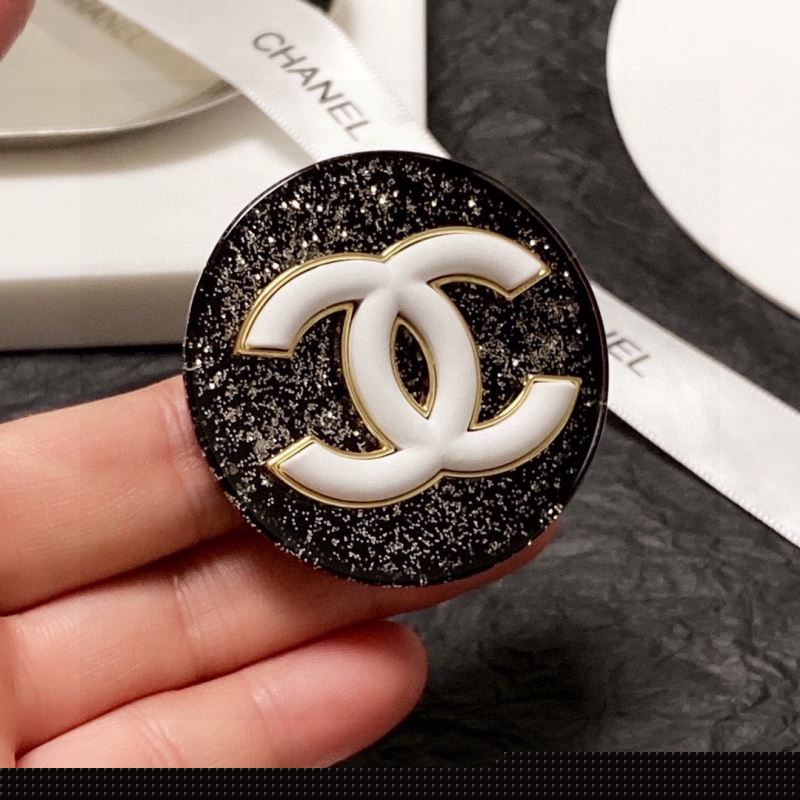Ch*el brooches